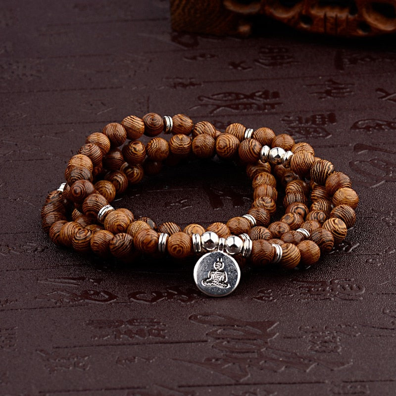 Bracelet Bouddhiste Tibétain en Perles de Bois avec Lotus OM